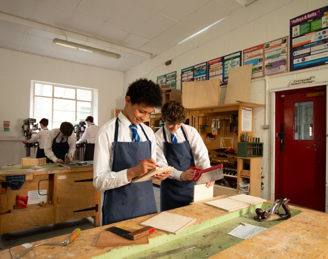 students working in the cooking room